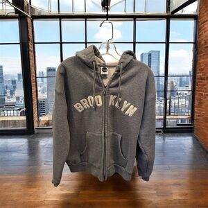 Vintage unisex Gray Blue Marlin Brooklyn Hoodie with Cream Lettering.